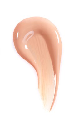 Lekeli sıvı bej beyaz arka plan üzerine makyaj 