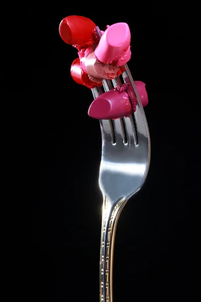 Sliced Lipsticks Impaled on a Fork — Stock Photo, Image