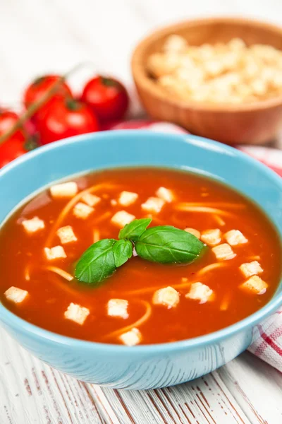 Tomato soup and basil — Stock Photo, Image