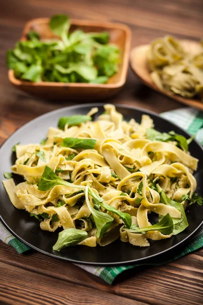Cooked tagliatelle on a plate — Stock Photo, Image