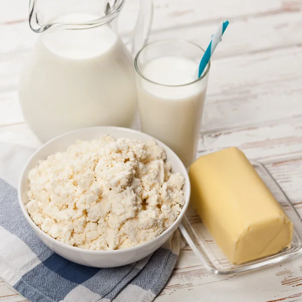 Milk jar on wooden table — Stock Photo, Image