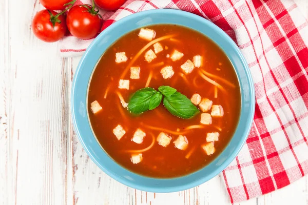 Tomato soup and basil — Stock Photo, Image