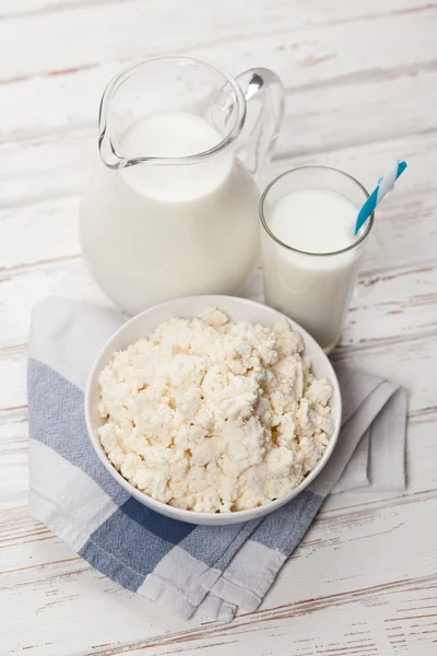 Milk jar on wooden table — Stock Photo, Image