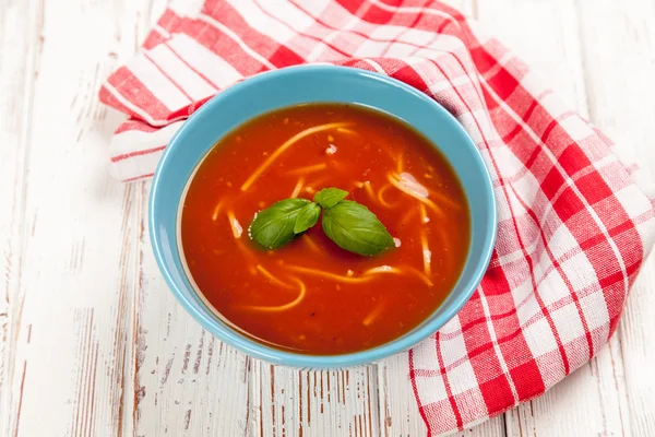 Tomato soup and basil — Stock Photo, Image