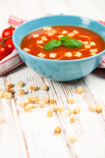 Tomato soup and basil — Stock Photo, Image