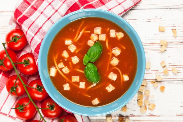 Tomato soup and basil — Stock Photo, Image