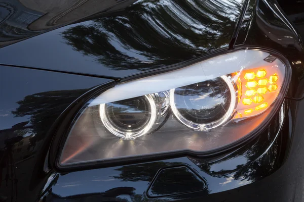 Headlights of 7 series BMW — Stock Photo, Image