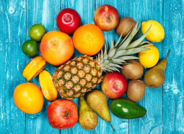 Set of colorful fruits on old wood background — Stock Photo, Image