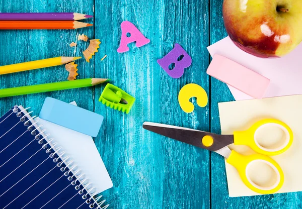 Office and school supplies on wooden surface — Stock Photo, Image