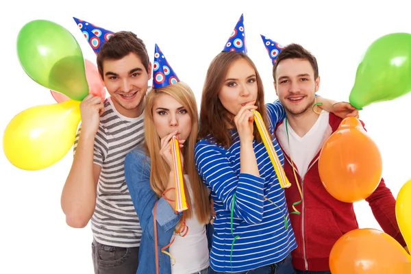 Group of young people having a birthday party Royalty Free Stock Images