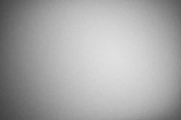 Слегка текстурированный серый градиентный фон — стоковое фото