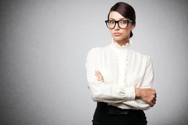 Strict woman in large glasses Royalty Free Stock Images