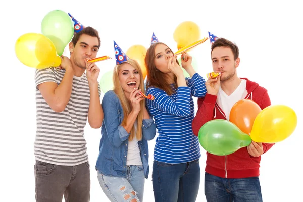 Group of young people having a birthday party Stock Picture