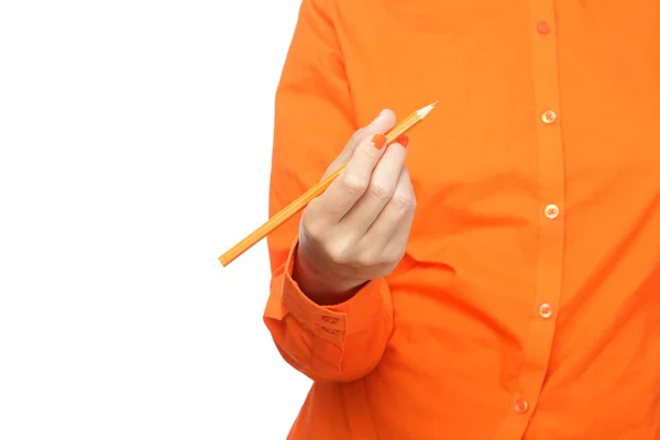 Mano femenina sosteniendo un lápiz — Foto de Stock