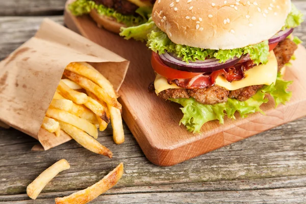 Delicious hamburger and fries — Stock Photo, Image