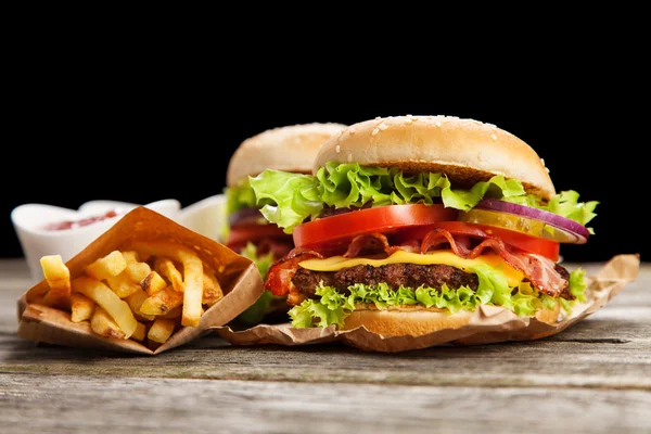 Delicious hamburger and fries — Stock Photo, Image
