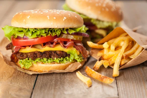Delicious hamburger and fries — Stock Photo, Image