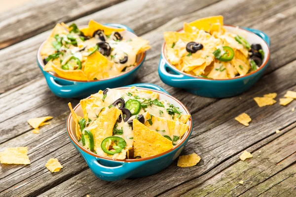 Nachos mit geschmolzenem Käse — Stockfoto