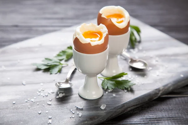 Boiled eggs on marble background