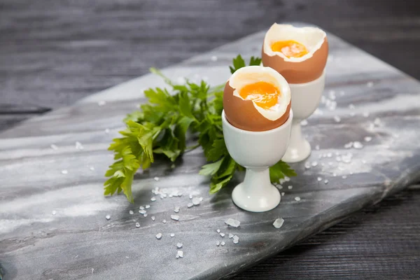 Boiled eggs on marble background