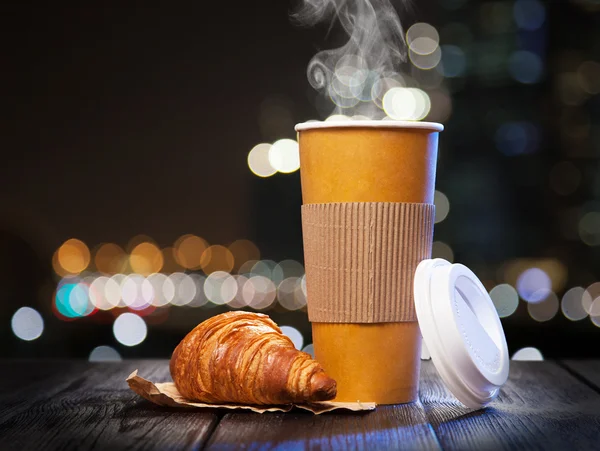 Coffee in a paper cup — Stock Photo, Image