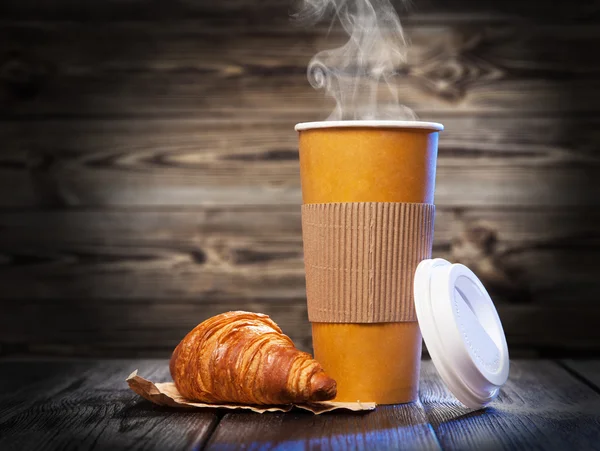 Coffee in a paper cup — Stock Photo, Image