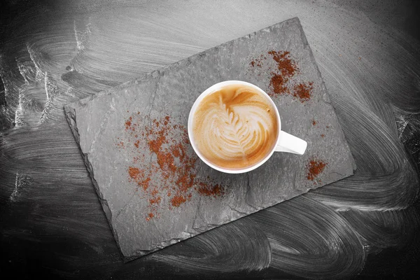 Cup of coffee on stone board — Stock Photo, Image