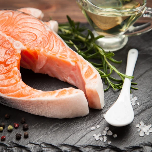 Fresh salmon on old wood — Stock Photo, Image