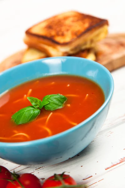 Tomato soup and basil — Stock Photo, Image