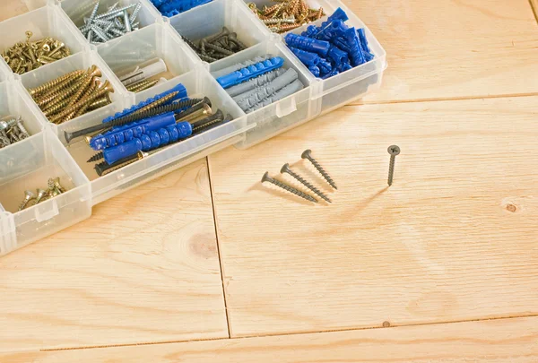 Screws and toolbox — Stock Photo, Image