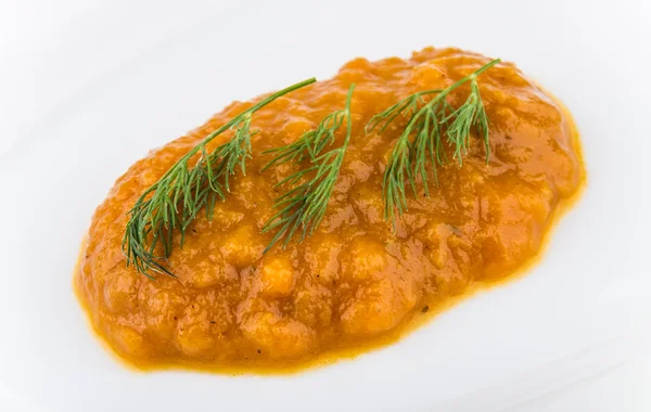 Squash caviar and dill in white glass plate