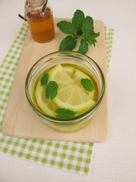 Pickled lemons with mint in vinegar — Stock Photo, Image