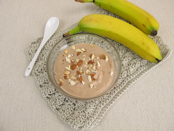 Homemade chocolate ice cream with frozen bananas, cocoa and almonds — Stock Photo, Image