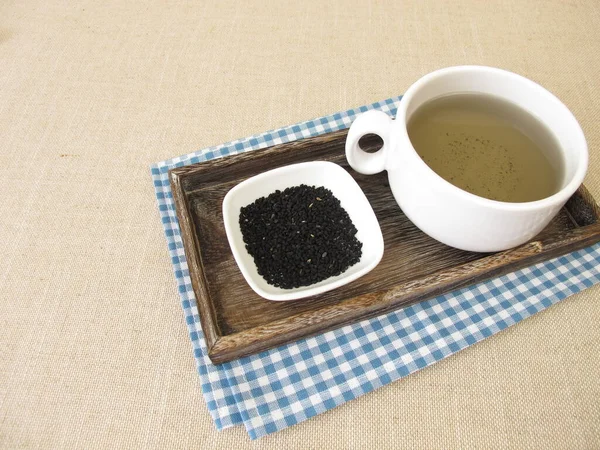 Eine Tasse Schwarzkümmeltee — Stockfoto