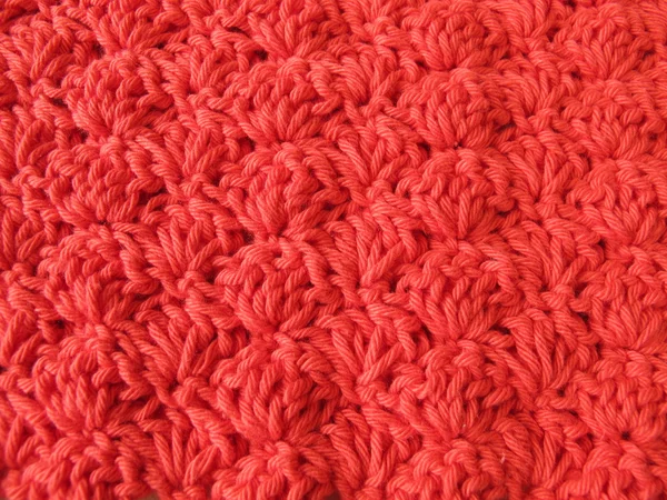 Background of crocheted shells in red — Stock Photo, Image