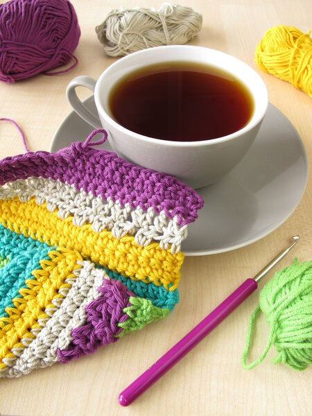 Crochet work and a cup of coffee