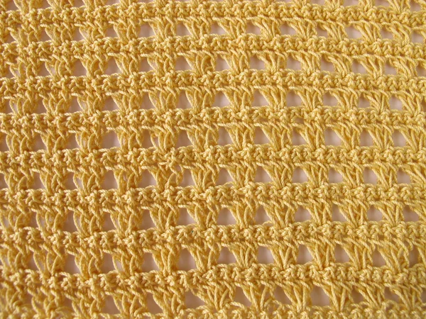 Crochet pattern background in yellow — Stock Photo, Image