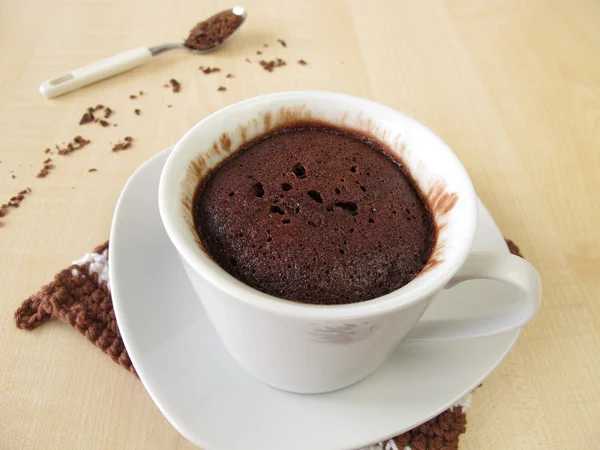 Chocolate mug cake in cup from microwave — Stock Photo, Image