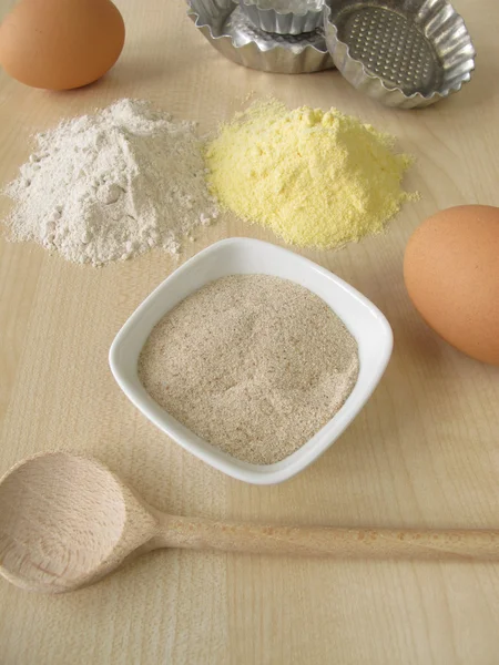 Ground psyllium seed husks, buckwheat and maize flour — Stock Photo, Image