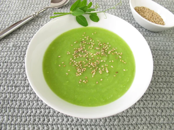 Pea soup with roasted sesame and pea shoots — Stock Image Pea soup with roasted sesame and pea shoots Stock Picture