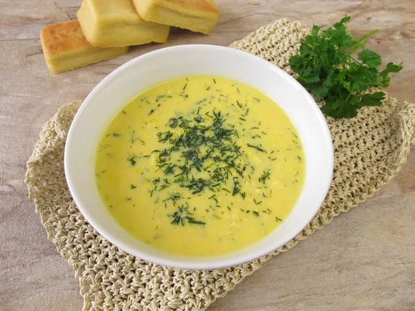Corn cream soup with garden herbs — Stock Photo, Image