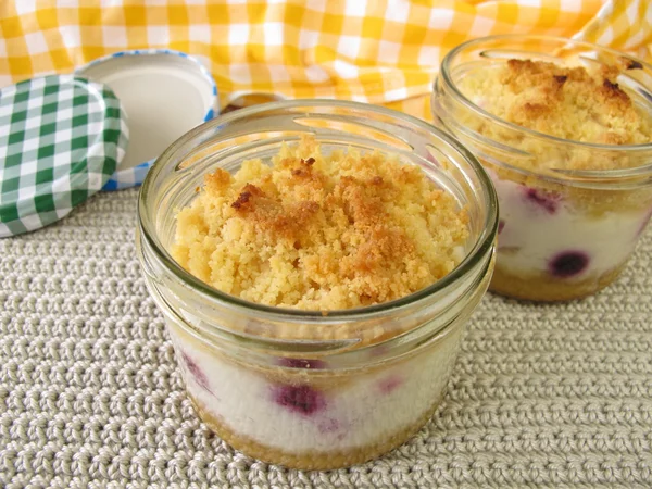 Cake in jar with berries and yogurt — Stock Photo, Image