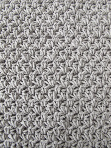Crochet pattern background in grey — Stock Photo, Image
