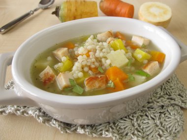 Vegetable soup with pearl barley and chicken clipart