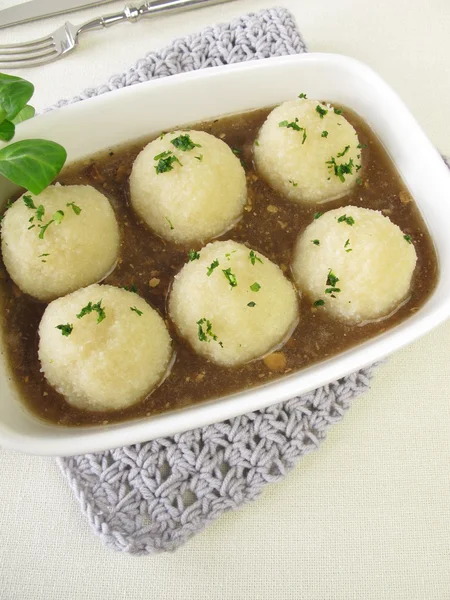 Potato dumplings with mushroom sauce — Stock Photo, Image