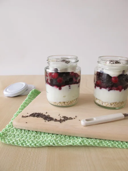 Yogurt with berries and chia topping — Stock Photo, Image