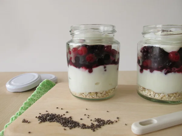 Yogurt with berries and chia topping — Stock Photo, Image