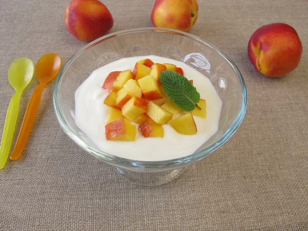 Natural yogurt with nectarines — Stok fotoğraf