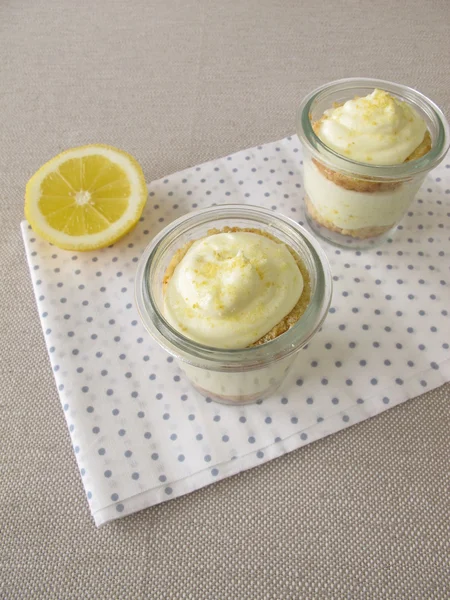 Lemon curd cream cake in glass — Stock Photo, Image