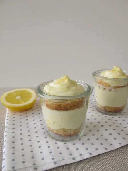 Lemon curd cream cake in glass — Stock Photo, Image